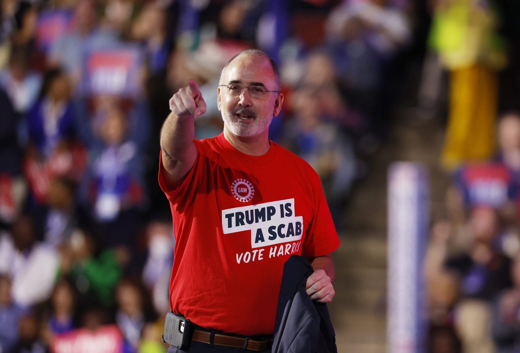 United Auto Workers President Shawn Fain speaks onstage during the first day of the Democratic National Convention at the United Center on August 19, 2024 in Chicago, Illinois. Photo by Kevin Dietsch/Getty Images
