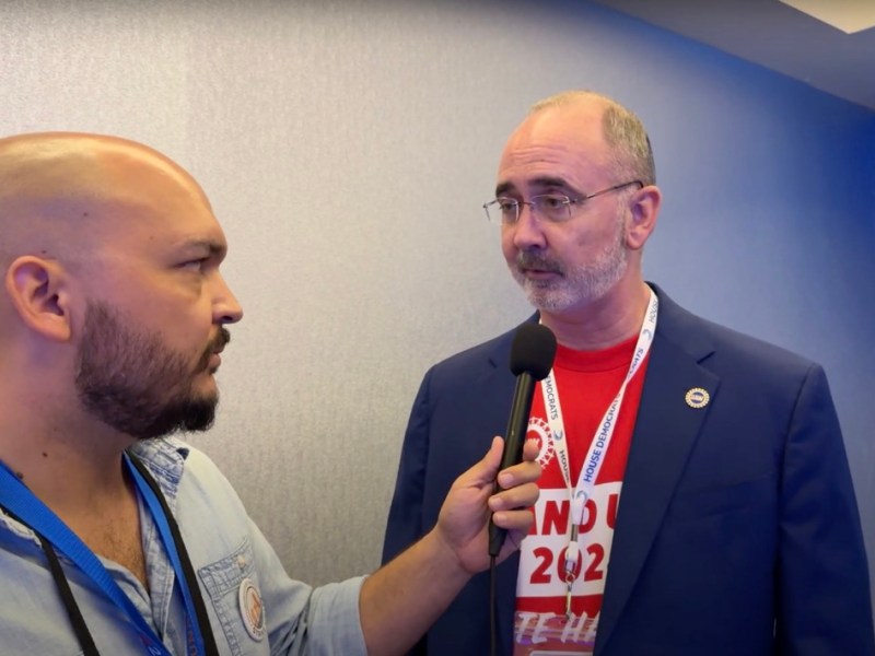 Still image of TRNN Editor-in-Chief Maximillian Alvarez (left) interviewing UAW president Shawn Fain (right) at the Democratic National Convention in Chicago on Aug. 21, 2024. Screenshot/TRNN.