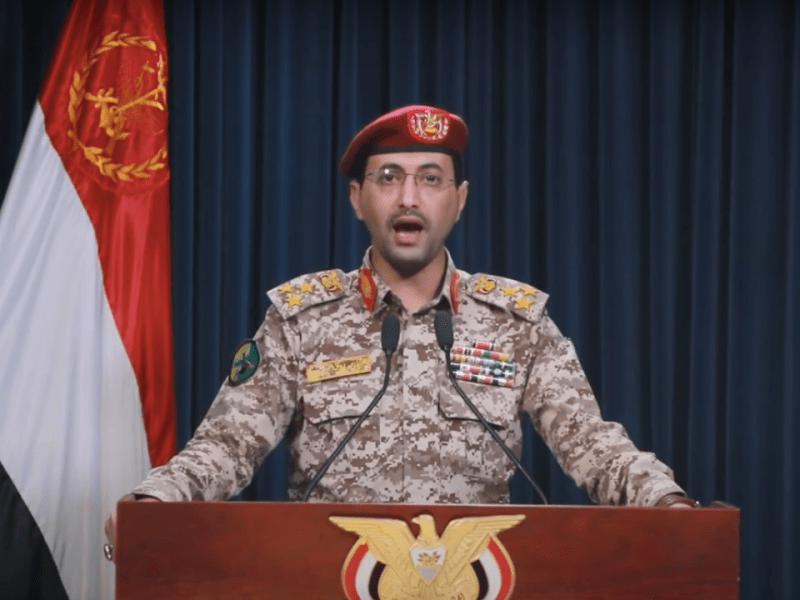 Ansarallah Spokesman Yahya Saree delivers an address reporting on a recent Yemeni military operation in the Red Sea. Screenshot courtesy of Al Masirah TV
